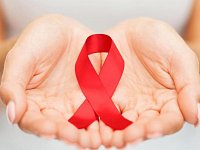 Красная ленточка - символ борьбы со СПИД